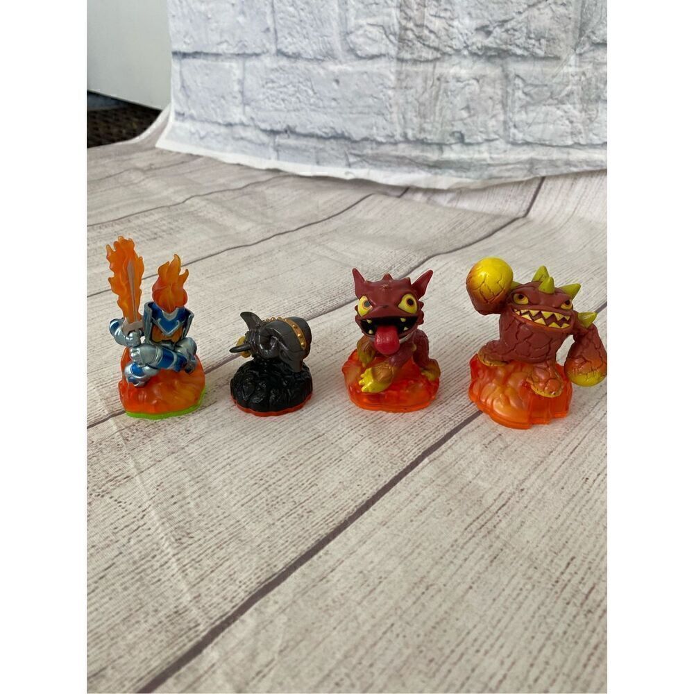 Skylanders Fire element action figure dolls lot of 4 assorted sizes